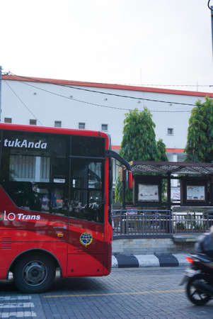 Surakarta, Indonesia â December 20, 2021: A public transportation in the city of Solo called BST (Batik Solo Trans) which serves to transport passengers from one bus stop to another. Perfect for newsのeditorial素材