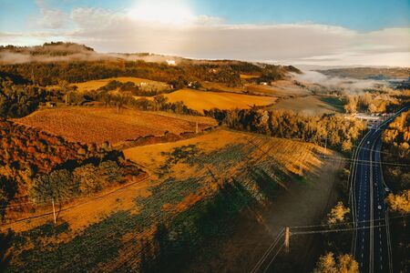  landscape with a view from a height of a cloud forest along a sunny road