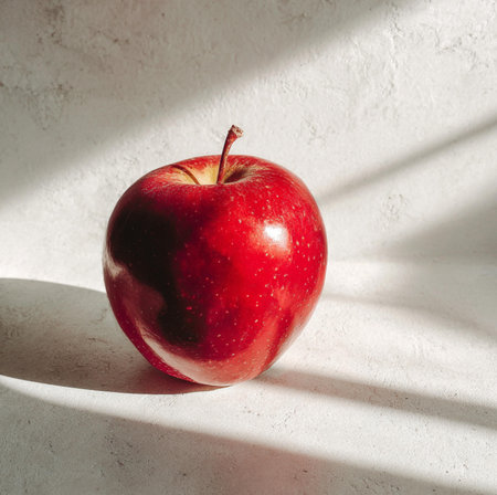 red apple on a white studio lightの素材