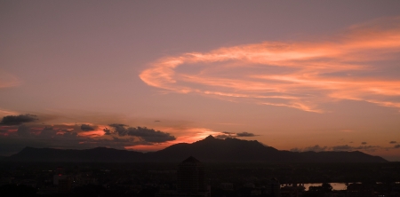 Dramatic sunset over mountainの写真素材