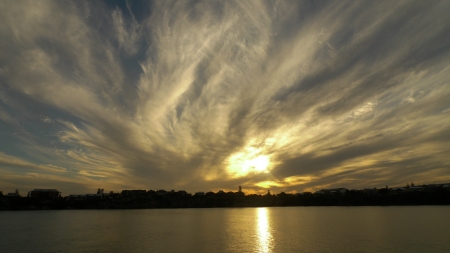 Dramatic clouds formation and sunset over suburbの写真素材