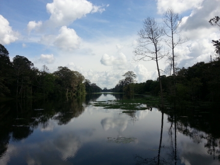Reflection of clouds over lake の写真素材