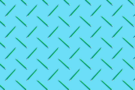 Back to school. Pattern of green pencils. The concept of office, business, creativity, training....