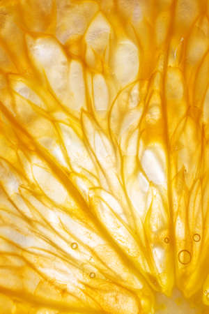 Bright juicy citrus pulp close-up. High-quality image is suitable for topics: healthy lifestyle,...