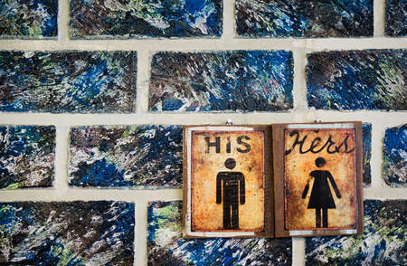 toilet sign on oil pastel wallの写真素材