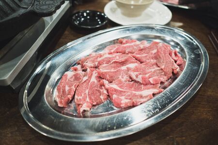 The lamb has been carefully cut. In order to have the perfect thickness for grilling the Jiangxi Khan meatの写真素材