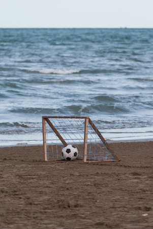 Beach ball in goalの写真素材