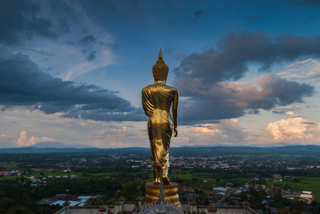 Buddha standing on a mountain in the North of Thailandの写真素材