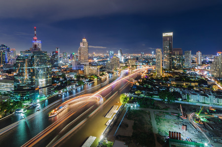 Chaophraya river and Bangkok cityscape at nightの写真素材
