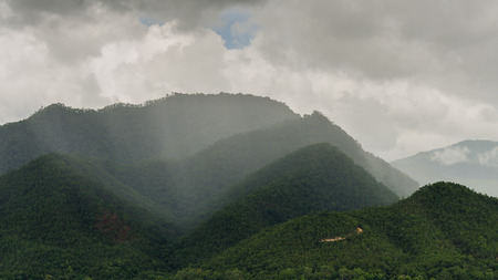 Cloud and rain on mountain, Thailandの写真素材