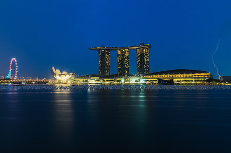Marina bay sands with thunder lightnings at twilightのeditorial素材