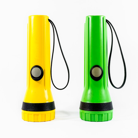two of plastic flashlight isolated on whiteの写真素材