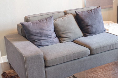 black sofa in livivng room with wooden tableの写真素材