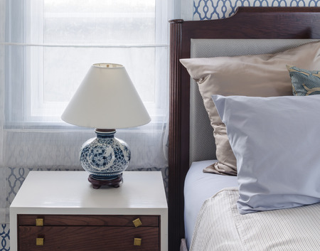 chinese lamp style on table side in luxury bedroomの写真素材