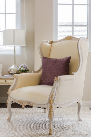 classic chair style with pillow on carpet in bedroom at homeの写真素材
