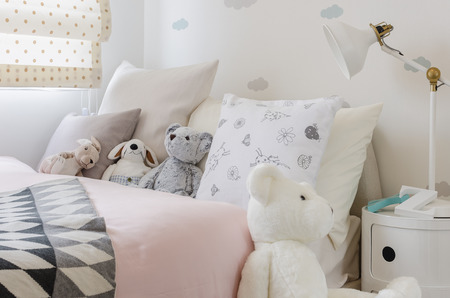 girl bedroom with dollの写真素材