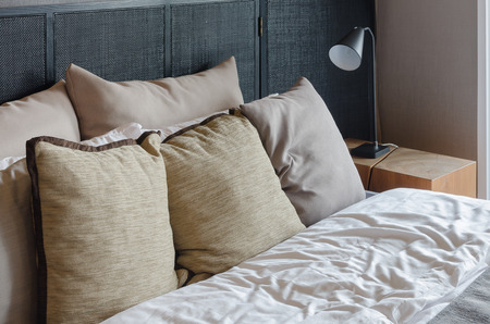 bedroom with black modern lampの写真素材
