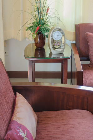 living room with red wooden chair and pillowの写真素材