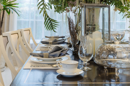 luxury dinning room with table set on wooden table at homeの写真素材