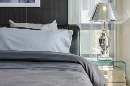 luxury lamp on table in bedroomの写真素材