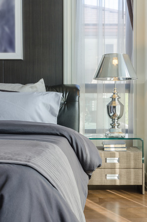 luxury lamp on table in bedroom at homeの写真素材