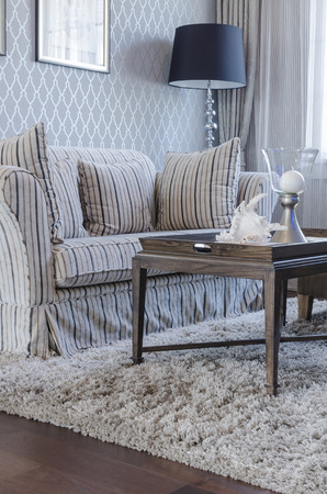 luxury living room with classic sofa and black lamp at homeの写真素材