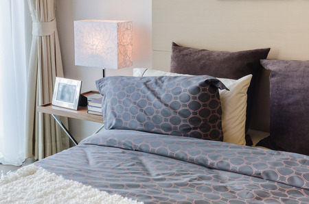 modern bedroom with modern lamp on table at homeの写真素材