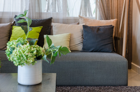 plants in white ceramic vase in living roomの写真素材
