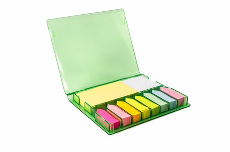 Set of colorful sticky note paper in a box isolated on white backgroundの写真素材