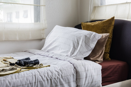 modern single bedroom with compass and binocularsの写真素材