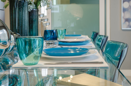 table set on glass tableの写真素材