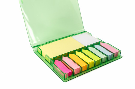 The set of colorful sticky note paper in a box isolated on white backgroundの写真素材