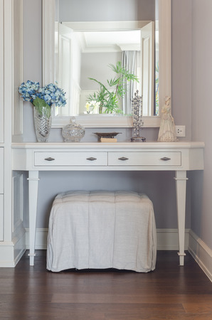 white dressing table with mirror at homeの写真素材