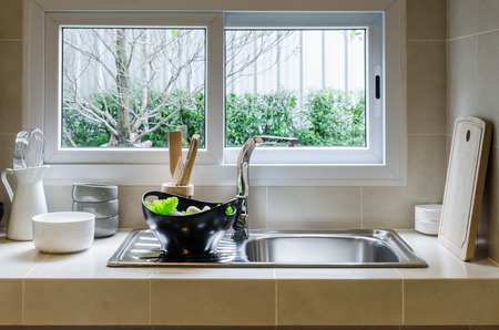 sink and counter in kitchen at homeの写真素材