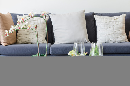 vase of plant on wooden table in living room at homeの写真素材