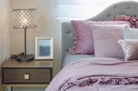 classic lamp style on wooden table side in bedroom at homeの写真素材