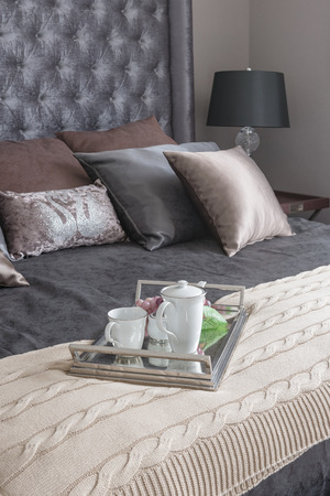 tray of tea set on blanket in luxury bedroom with king bed sizeの写真素材