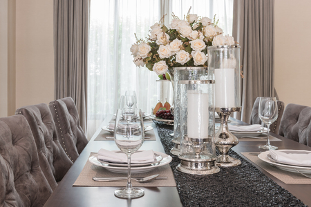 luxury dinning room vase of flower on wooden table at homeの写真素材