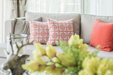 pillows on modern sofa with blur foreground effect, interior designの写真素材