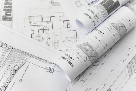 architectural for construction drawings  with roll of blueprintの写真素材