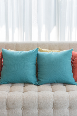 colorful pillows on classic sofa style in living roomの写真素材