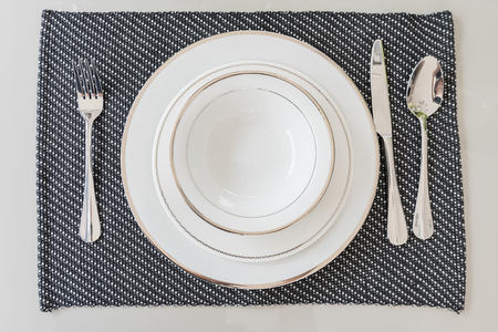 empty white plate, dinner setting, top view imageの写真素材
