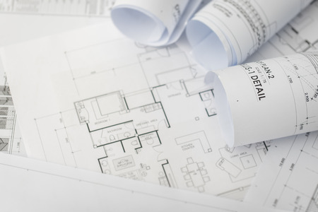 architectural for construction drawings  with roll of blueprintの写真素材