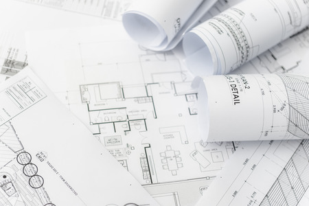 architectural for construction drawings  with roll of blueprintの写真素材