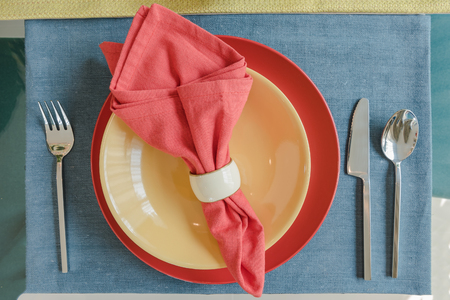 table set on dining table in colorful dining room designの写真素材