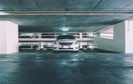 Empty parking lot in car parking floor, vintage style picture processの写真素材