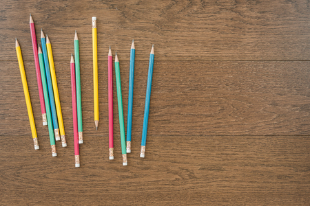multicolor pencils on wooden background with copy spaceの写真素材
