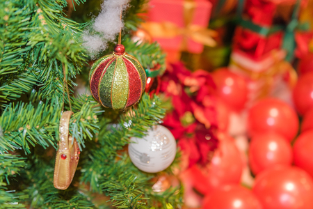 Decorated Christmas tree on blurred, sparkling and fairy backgroundの写真素材
