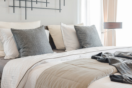modern bedroom with modern lamp style on wooden table sideの写真素材