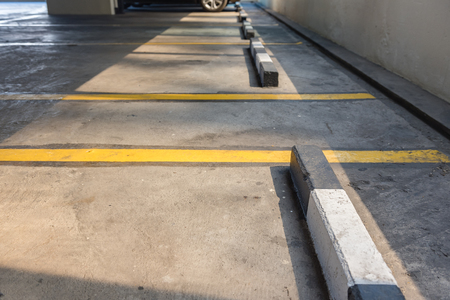 Empty parking lot in car parking floor with copy spaceの写真素材